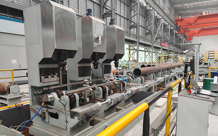 Spiral forward ultrasonic automatic flaw detection machine for steel pipes